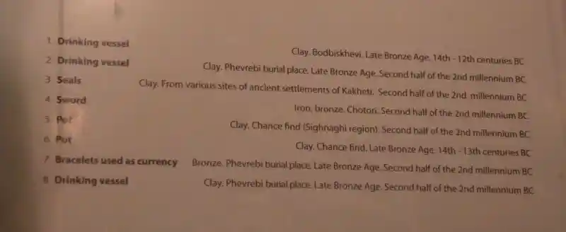 Cross shaped stamp with swastika design inside